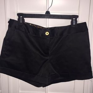 Express black design studio shorts.